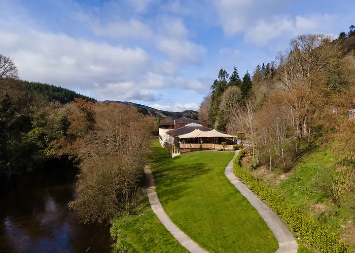 Отель Woodenbridge Hotel