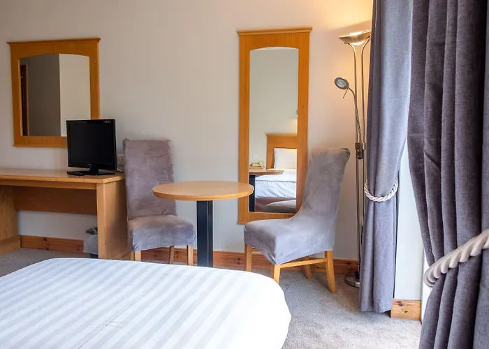 Отель Woodenbridge Hotel