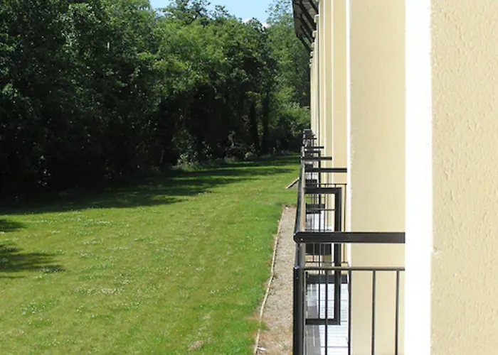 Woodenbridge Hotel Отель